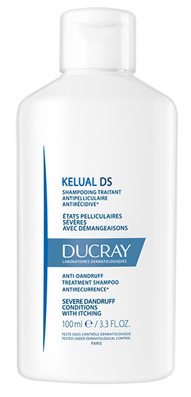 En flaske Kelual DS shampoo til rød og irriteret hovedbund med skæl og tendens til eksem
